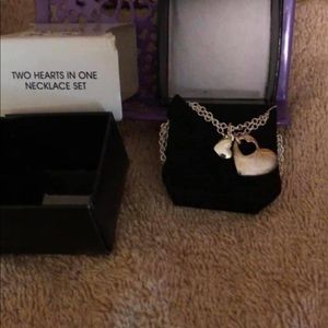 Two hearts in one necklace Avon